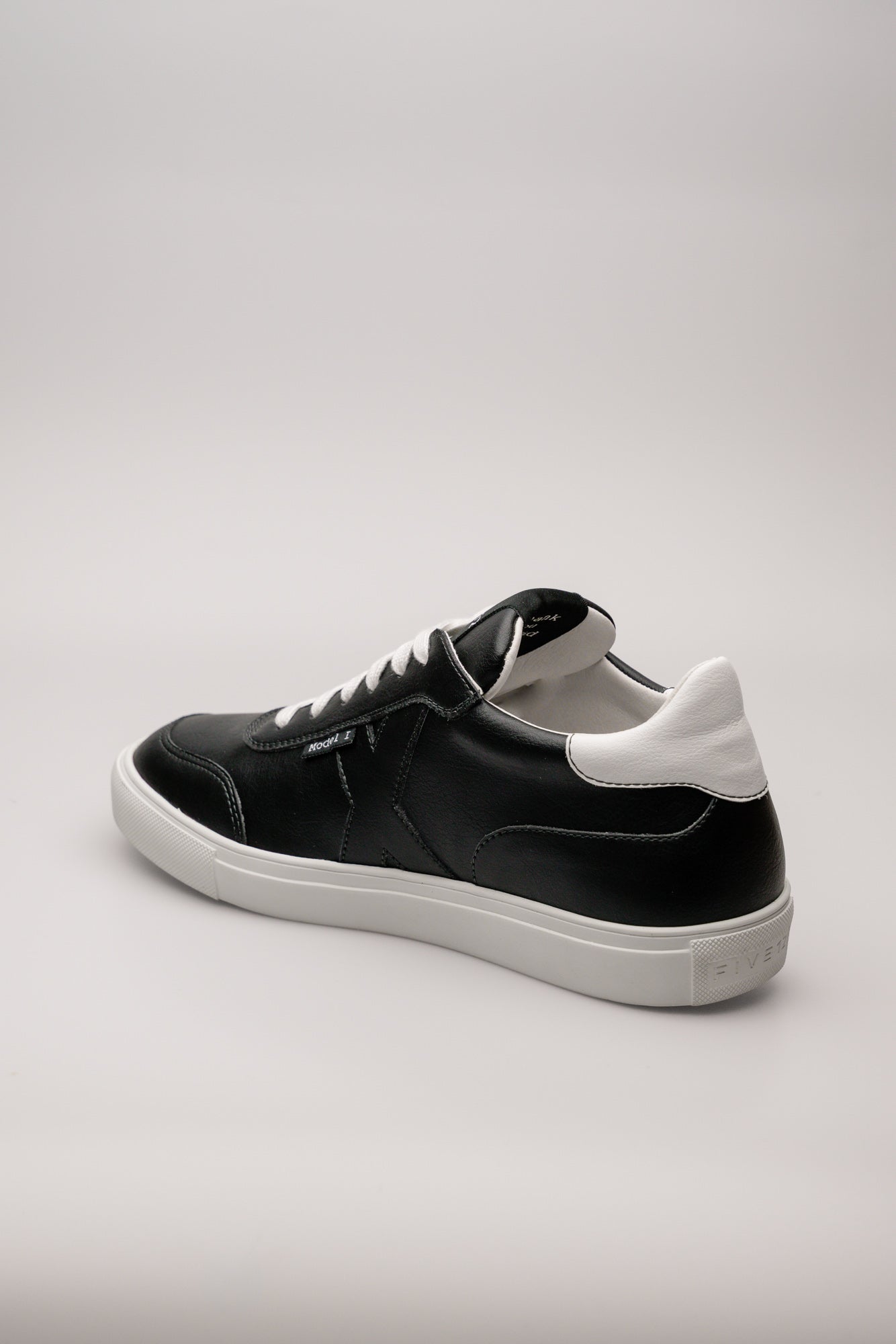 Black n white sneakers on sale